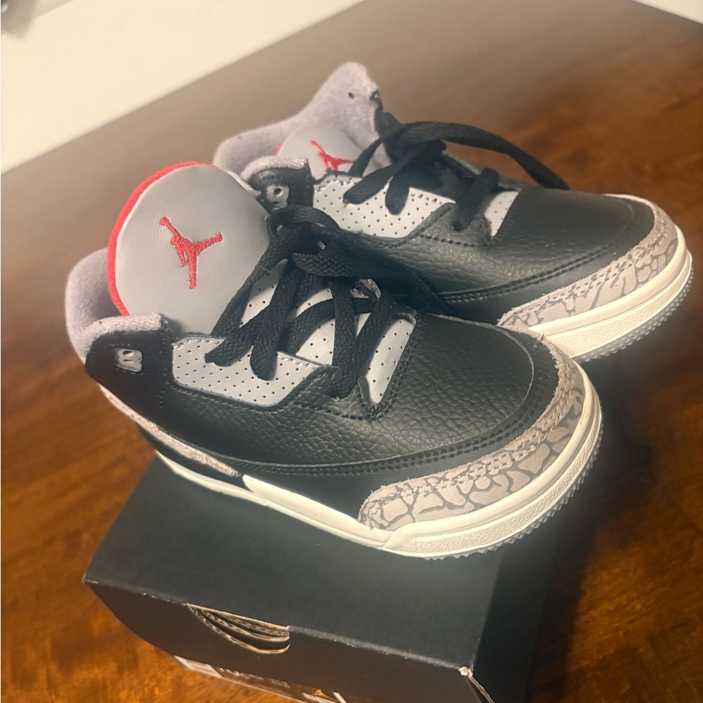 Jordan Kids Black and White Sneakers with Red Accents
